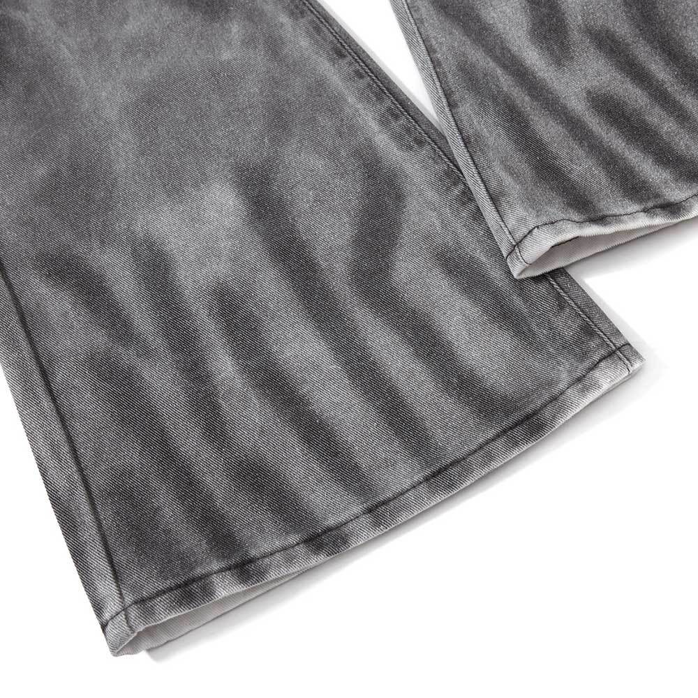 Spray painted dirty jeans
